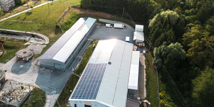 Solar Panels for Manufacturing Plants. An image of solar panel installation on the roof of a factory.