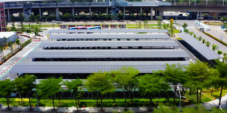 Solar carport Office Premises. An image of an aerial view of solar system carpark surrounded by trees